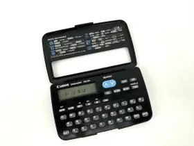 DM-320 CANON Organizer Digital Databank Pocket Calculator