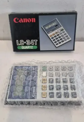 LC-34T CANON Quartz Pocket Alarm Calculator Nos