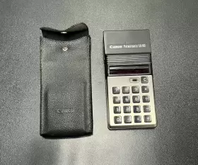 LE-83 CANON Palmtronic Led Calculator