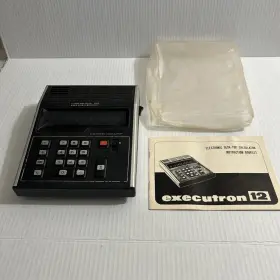 K124 EXECUTRON Calculator Manual Power Cord Sure