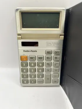 65-891 RADIOSHACK Radio Dual Pocket Calculator Solar Battery