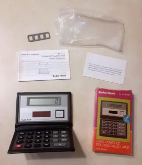 EC-211 RADIOSHACK Radio Dual Power Calculator Box Pocket