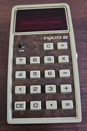 EX-22 TEXAS INSTRUMENTS Exactra Calculator Led Bubble Display