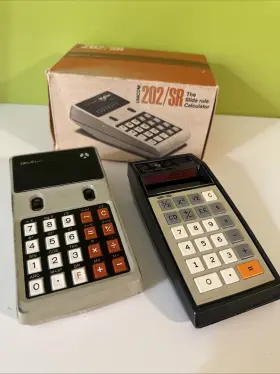 202-SR UNICORN AND TEXAS INSTRUMENTS Slide Rule Calculators