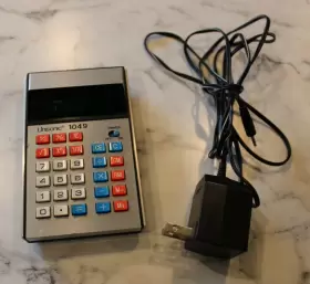 1049 UNISONIC Calculator Plug
