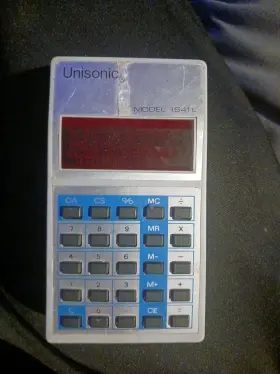 154IL UNISONIC Calculator Box