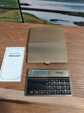 7220 UNISONIC Personalized Jerry Lc Pocket Calculator