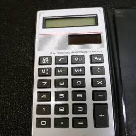 LC-374 UNISONIC Dual Power Solar Battery Up Pocket Calculator #2