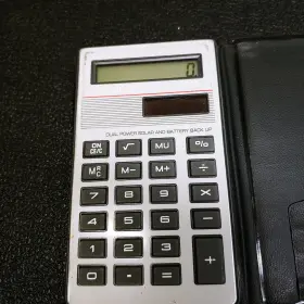 LC-374 UNISONIC Dual Power Solar Battery Up Pocket Calculator #3