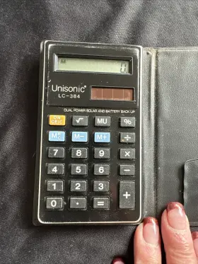 LC-384 UNISONIC Calculator