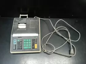 XL-124 UNISONIC Calculator Adding Light Lit