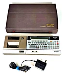 Sharp Pc1500a Pocket Computer W/ Ce150 Printer/cassette Interface Turns On Case. Fixed Price $229.99.