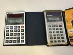 Lot Of 2 Vintage Sharp Elsi Mate Solar Calculators El-326t El-326s W/cases. Fixed Price $30.00.
