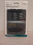 Vintage New Old Stock Radio Shack Pocket Data Organizer Calculator 65-1204. Fixed Price $12.84.