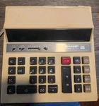 Vtg Sharp Compet Qs-1122a 10 Digit Desktop Electronic Calculating Machine. Fixed Price $30.00.
