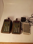 2 Vintage Hp-67 Programmable Calculators 1 Works For Parts With Charger 1722. Fixed Price $325.00.