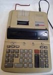 Texas Instruments Ti-5660 Superview 12-digits 2-color Printing Calculator. Fixed Price $15.00.