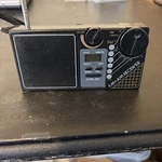 Travelers' Lcd Clock 2 Bands Radio Mfr-88. Fixed Price $12.00.