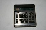 Vtg Canon Canola L812 Calculator 1975 L-812 Vacuum Fluorescent Display Green. Fixed Price $39.95.