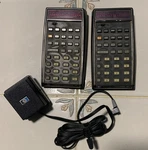 Vintage (2) Hewlett Packard Hp-80 Calculator With 1 Charger. Fixed Price $100.00.