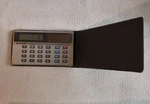 Vintage Sharp Elsi Mate El-848s Solar Pocket Calculator With Case. Fixed Price $8.75.