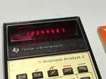 Vintage - Ti Business Analyst 1 Pocket Calculator Red Vacuum Fluorescent Display. Fixed Price $19.99.