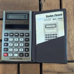 Vintage Radio Shack Ec-402 Solar Powered Calculator Folio Case Cat No 65-689. Fixed Price $15.68.