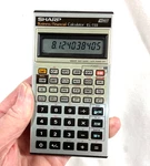 Sharp El-733 Business Financial Calculator W/cover & New Batteries. *tested*. Fixed Price $8.99.