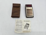 Vintage Texas Instruments Ti-1400 Calculator In Brown Case. Fixed Price $15.00.
