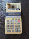 Sharp Elsi Mate Hand Held Electronic Calculator El-1611s. Fixed Price $10.00.