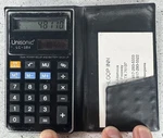 Vintage Working Unisonic Lc-384 Dual Power Calculator With Case. Fixed Price $4.50.