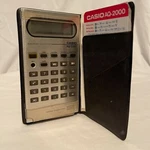 Vtg Casio Model Aq-2000 Pocket Calendar Calculator W/ Case Untested For Parts. Fixed Price $10.50.
