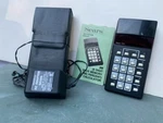 Vintage 1974 Sears 8m Calculator With Adaptor, Sleeve & Manual Model #801.58240. Fixed Price $9.99.
