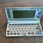 Vintage Sharp Wizard Oz-770 Electronic Organizer - Screen Issues. Fixed Price $29.99.