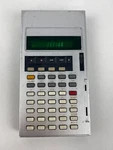 Vintage Sharp Elsi-mate El-5001 Electronic Graphing Calculator. Fixed Price $99.00.