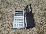 Sharp El-326s Calculator With Case And Instructions. Fixed Price $15.00.
