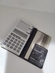 Vintage Sharp Elsi Mate El-640 Voice Synthesized Clock & Calculator, Case Manual. Fixed Price $124.99.