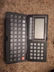 Vintage Unisonic Dd-5805 Pocket Computer Diary / Calculator Organizer Pda, Black. Fixed Price $30.00.