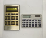 Lot Of 2 Vintage Pocket Calculators (sharp, Texas Instruments). Fixed Price $18.00.