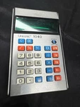 Vintage Unisonic 1040 Calculator Missing Battery Cover. Fixed Price $12.00.