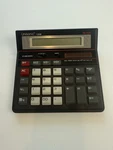 Vintage Unisonic 1295b Twelve Digit Calculator Dual Solar Battery Powered Works. Fixed Price $7.50.