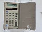 Texas Instruments Ti-1706 Vintage Solar Calculator With Tan Wallet Case. Fixed Price $13.99.