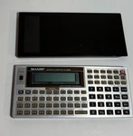 Sharp El-5500 Ii Scientific Calculator And Basic Computer, Works Great!. Fixed Price $39.99.