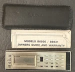 Vintage Bulova Quartz Alarm Clock / Calculator With Leather Sleeve - Preowned. Fixed Price $10.00.