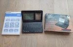 Sharp Iq-8300m Electronic Organizer. Fixed Price $125.00.