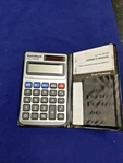 Vintage Radioshack Dual Powered Pocket Calculator 65-924 Wallet Case & Manual. Fixed Price $14.99.