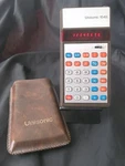Bicentennial Unisonic 1548 Calculator, Red Dot Leds,+charger+instruction Sheet. Fixed Price $39.99.