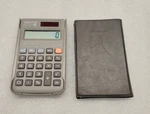 Vintage Aurora Hc102 Solar Calculator Gray W/ Casio Pocket Cover. Fixed Price $8.10.