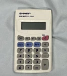 Original Sharp Elsi Mate El-233s - Basic Functions Pocket Calculator. Fixed Price $9.99.