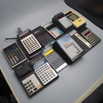 Lot Of 12 Vintage Calculators Lloyd's Accu-matic 335 Ti-30 Casio Fx-140. Fixed Price $87.74.